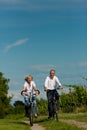Happy couple cycling outdoors in summer Royalty Free Stock Photo