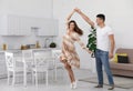 Happy couple dancing in kitchen Royalty Free Stock Photo