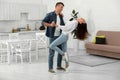 Happy couple dancing in kitchen Royalty Free Stock Photo