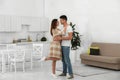 Happy couple dancing in kitchen Royalty Free Stock Photo