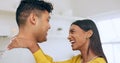 Happy, couple is dancing in kitchen and hug for love with affection, bonding and romantic date at home. Fun, interracial Royalty Free Stock Photo