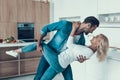 Happy couple dancing in kitchen. Romantic relationship. Royalty Free Stock Photo
