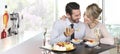 Happy couple date at the bar with wine and cake, love conc Royalty Free Stock Photo