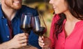 Happy couple dining and drink wine at restaurant Royalty Free Stock Photo