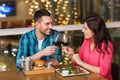 Happy couple dining and drink wine at restaurant Royalty Free Stock Photo