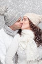 Happy couple dressed in warm clothes in winter Royalty Free Stock Photo