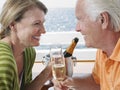 Happy Couple Drinking Champagne On Yacht Royalty Free Stock Photo