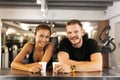 Happy couple drinking coffe in a fitness club Royalty Free Stock Photo