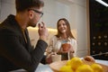 Happy couple drinking coffee at home kitchen with luxury interior Royalty Free Stock Photo