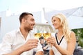 Happy couple drinking wine at open-air restaurant Royalty Free Stock Photo