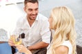 Happy couple drinking wine at open-air restaurant Royalty Free Stock Photo