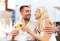 Happy couple drinking wine at open-air restaurant Royalty Free Stock Photo
