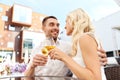 Happy couple drinking wine at open-air restaurant Royalty Free Stock Photo