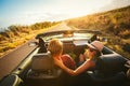 Happy Couple Driving in Convertible Royalty Free Stock Photo
