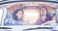 Happy couple driving minivan for a road trip - Young people having fun on summer vacation traveling around the world - Travel,love Royalty Free Stock Photo