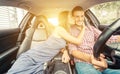 Happy couple driving on a sport car Royalty Free Stock Photo