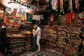 Happy couple in the Eastern country. Man and woman in the store. Couple in love in Turkey. Happy couple travels the world. Persian Royalty Free Stock Photo