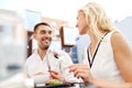 Happy couple eating dinner at restaurant terrace Royalty Free Stock Photo