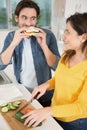 happy couple eating vegetable salad and sandwhich Royalty Free Stock Photo