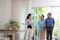 Happy couple elderly looking new home while agent real estate explaining and visit. Royalty Free Stock Photo
