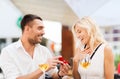 Happy couple with engagement ring and wine at cafe Royalty Free Stock Photo