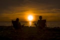 Happy couple enjoy luxury sunset on the beach during summer vacations Royalty Free Stock Photo