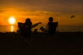 Happy couple enjoy luxury sunset on the beach during summer vacations Royalty Free Stock Photo