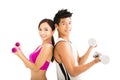 happy couple exercising with dumbbell Royalty Free Stock Photo