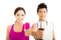 happy couple exercising with dumbbell Royalty Free Stock Photo