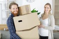 Happy couple expecting baby moving houses Royalty Free Stock Photo