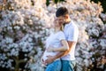 Happy couple expecting baby, pregnant woman with husband, young family and new life concept Royalty Free Stock Photo