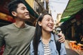 Happy couple exploring the Hanoi city