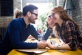 Happy couple flirting and dating in restaurant Royalty Free Stock Photo