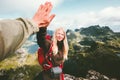 Happy couple friends giving five hands hiking in mountains Royalty Free Stock Photo