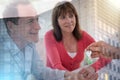 Happy couple getting house keys from realtor; multiple exposure Royalty Free Stock Photo