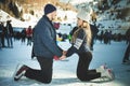 Happy couple, girls and boy ice skating outdoor at rink Royalty Free Stock Photo