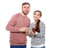 Happy couple with glass jar full of dollar banknotes and wallet on white background. Money savings concept Royalty Free Stock Photo