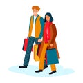 Happy couple go with paper shopping bags. Young stylish man woman go for gifts. Guy and girl in autumn winter clothes Royalty Free Stock Photo