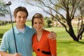 Happy Couple At Golf Course Royalty Free Stock Photo