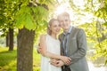 Happy couple. Handsome man and beautiful woman in park Royalty Free Stock Photo