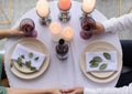 happy couple have a romantic date in a fine dining restaurant they drink wine and clinking glasses, cheers Royalty Free Stock Photo