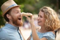 happy couple having date and eating ice cream Royalty Free Stock Photo