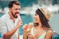 Happy couple having date and eating ice cream Royalty Free Stock Photo