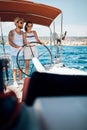 Happy Couple Having Fun On A Boat Trip