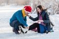 Happy couple having fun ice skating on rink outdoors. Royalty Free Stock Photo