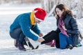 Happy couple having fun ice skating on rink outdoors. Royalty Free Stock Photo