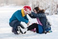 Happy couple having fun ice skating on rink outdoors Royalty Free Stock Photo