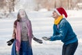 Happy couple having fun ice skating on rink outdoors. Royalty Free Stock Photo