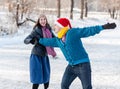 Happy couple having fun ice skating on rink outdoors. Royalty Free Stock Photo