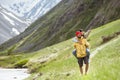 Happy couple walk mountains piggyback Royalty Free Stock Photo